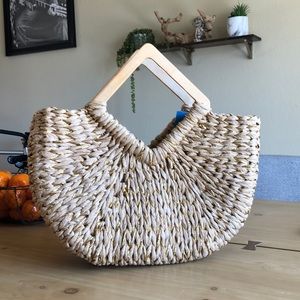 Gold and rattan woven bag with wooden handles